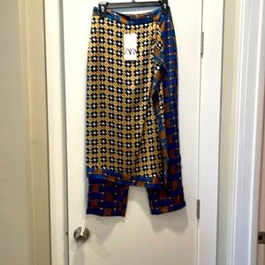 Zara silk slacks with drape giving India vibes. Elegant and unique